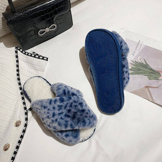 Criss cross leopard print slippers in Blue